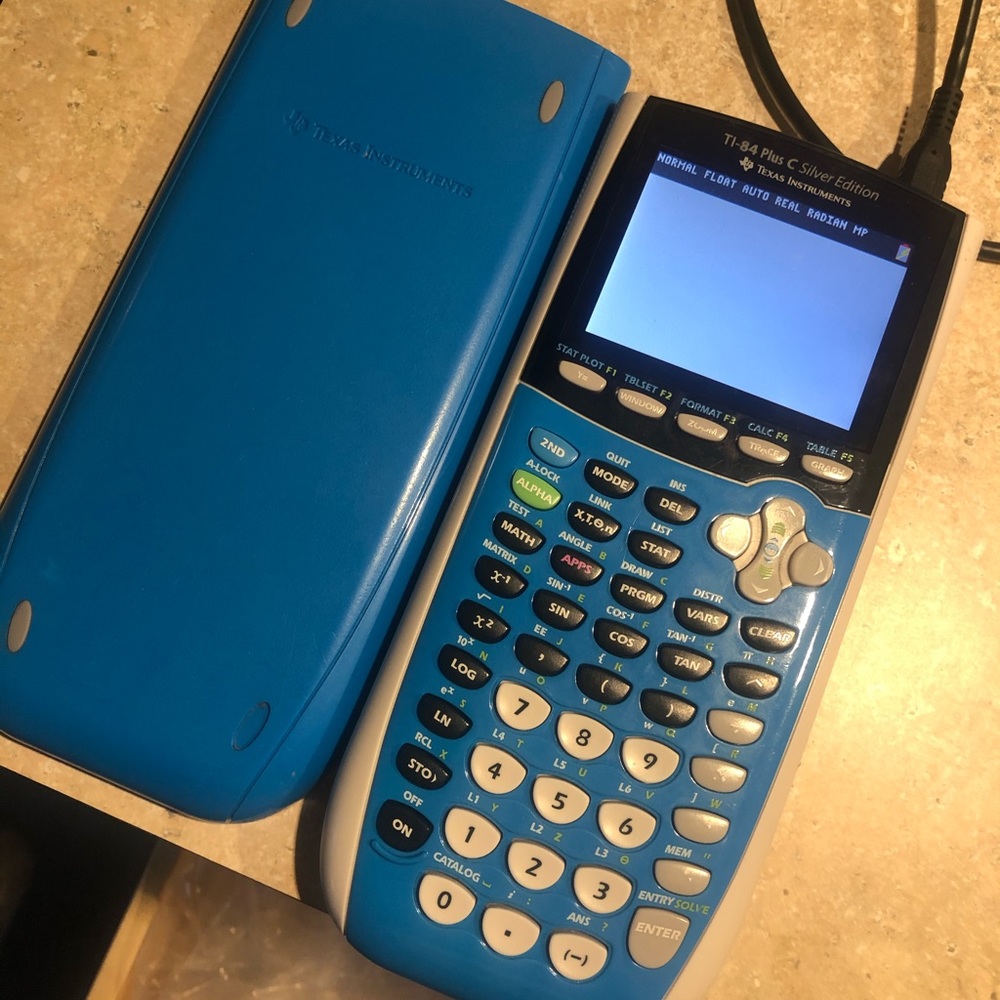 Texas Instrument TI-84 Graphing Calculator - Picture 2 of 2